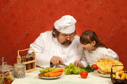 Photo: Cook and girl Cook and girl