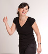 Brunette laughing at a funny joke