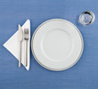plate on blue tablecloth