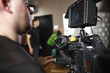 Foto: Cameraman operating digital cinema camera Cameraman operating digital cinema camera