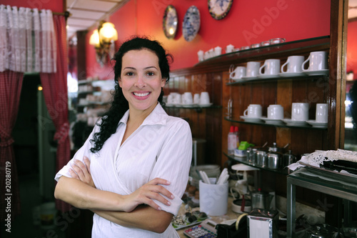 Photo: proud and confident owner of a cafe/ pastry shop proud and confident owner of a cafe/ pastry shop