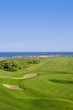 Golf course green grass near sea ocean Golf course green grass near sea ocean