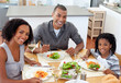 Foto: Ethnic couple dining with their son Ethnic couple dining with their son