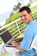handsome man using laptop