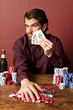 man winning at poker