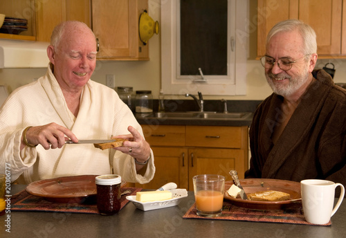 Photo: mature gay couple having breakfast mature gay couple having breakfast