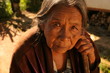 Old woman looking at the camera thoughtfully