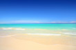 Idyllic beach with white sand and turquoise blue waters