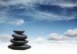 Zen stones over blue sky background Zen stones over blue sky background
