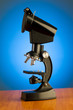 ����: Microscope against blue gradient background � Elnur #20347334