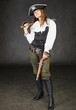 Girl dressed as pirate on black with sword