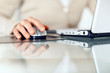 Cropped image of businesswoman working on laptop Cropped image of businesswoman working on laptop