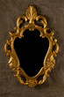 gold vintage frame on fabric wall