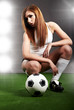 Sexy soccer player, woman on playing field