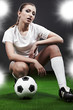 Sexy soccer player, woman on playing field