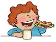 Young boy eating hotdog