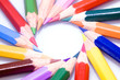 circle of bright color pencils