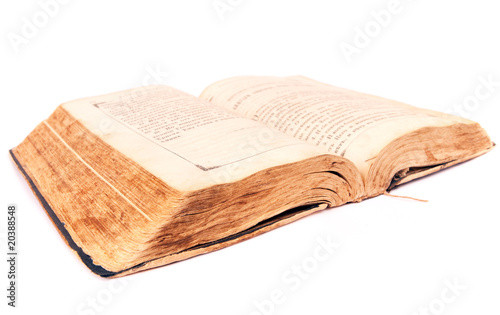 Photo: old book isolated on a white background old book isolated on a white background