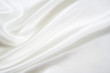 Smooth elegant white silk as background Smooth elegant white silk as background