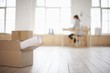 Woman sits at desk in window area of loft apartment