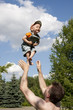 Foto: Father playing with son (funny flights) Father playing with son (funny flights)