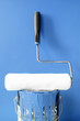 Foto: Roller and blue paint Roller and blue paint
