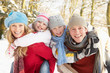 Family Having Fun Snowy Woodland Family Having Fun Snowy Woodland