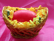 Egg in a bascket wiht yellow flower Egg in a bascket wiht yellow flower