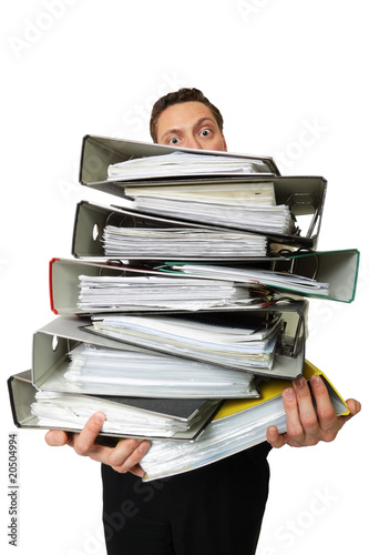 Foto: Junger Mann hat Stress im Büro Junger Mann hat Stress im Büro
