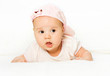 Portrait baby girl wearing pink hat