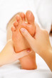 Foto: Foot massage and spa foot treatment. Foot massage and spa foot treatment.