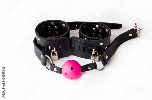 Photo: Gag and leather handcuffs. Gag and leather handcuffs.