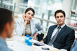 Business colleagues sitting attentively for a meeting