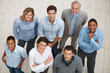 Top view of happy business coworkers standing in a group