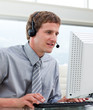 Portrait of businessman with headset on