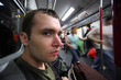 Man in subway car Man in subway car
