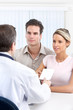 doctor and young couple