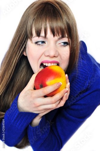 Photo: woman eating red apple woman eating red apple