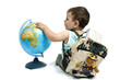 Baby boy with backpack and globe