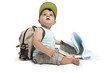 Baby boy with backpack and map