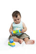 Baby boy playing with building blocks