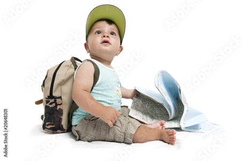 Photo: Baby boy with backpack and map Baby boy with backpack and map