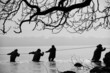 Fishermen in the water Fishermen in the water