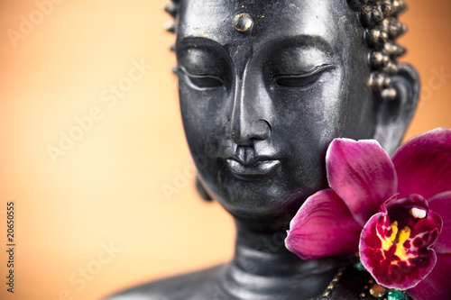 Foto: Bouddha et fleur d'orchidée Bouddha et fleur d'orchidée