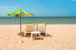 Beach with two sunbeds and umbrella Beach with two sunbeds and umbrella