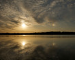 Beautiful sunset over a reservior with reflections in the water. Beautiful sunset over a reservior with reflections in the water.