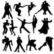 Silhouettes of the pairs dancing ballroom dances.