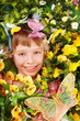 Beautiful girl with butterfly and flower.