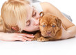 Young girl with puppy of Dogue de Bordeaux (French mastiff) Young girl with puppy of Dogue de Bordeaux (French mastiff)