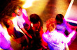 Young adults at a nightclub dancing